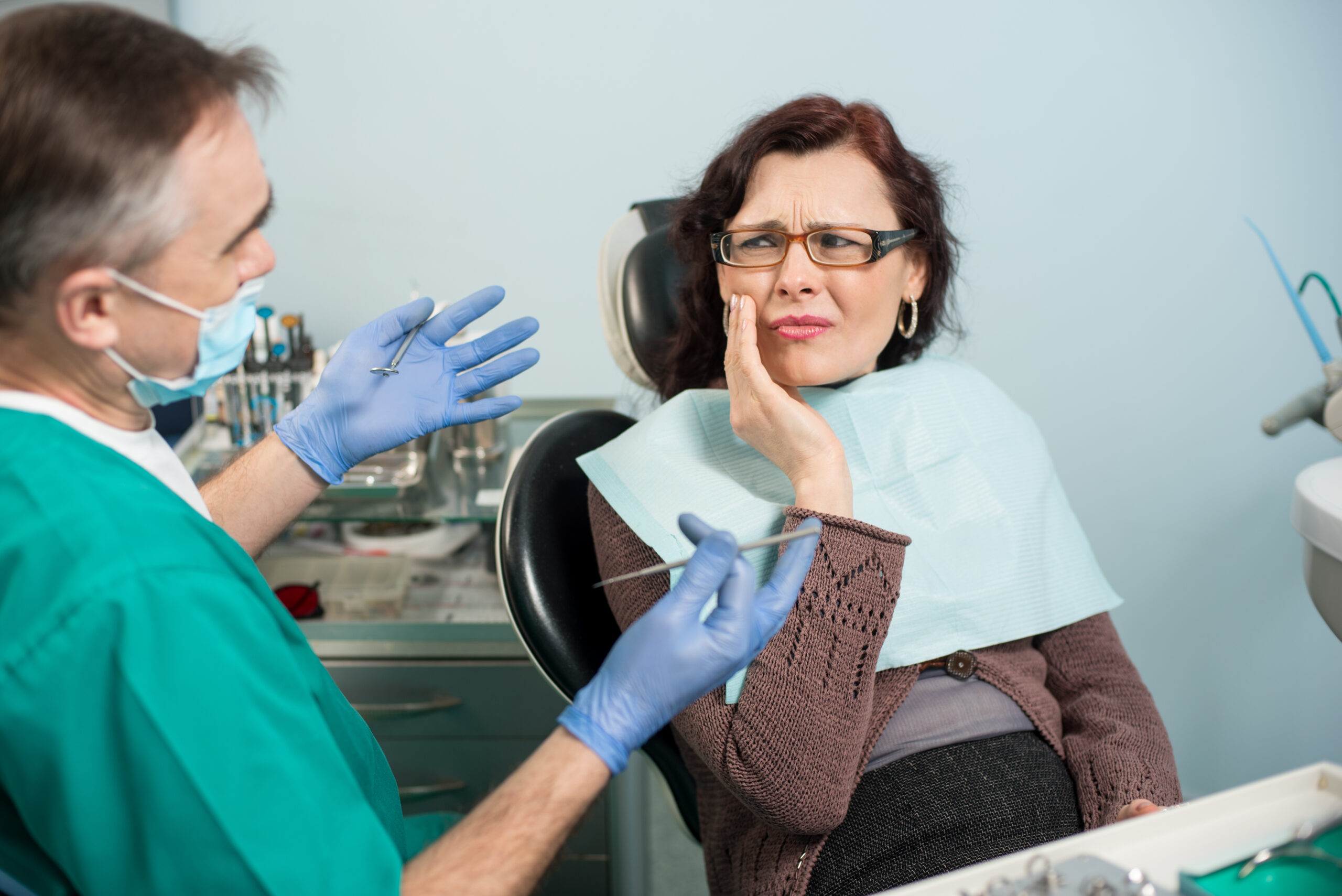 Woman in need of emergency dental care in Santa Rosa, CA 95405